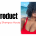 black woman with naturally curly hair at the beach wearing a red bathing suit and sunglasses on a website banner about moisturizing shampoo hacks.